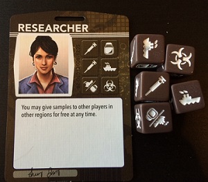 ResearcherCloseUpOfRoleCardAndDice